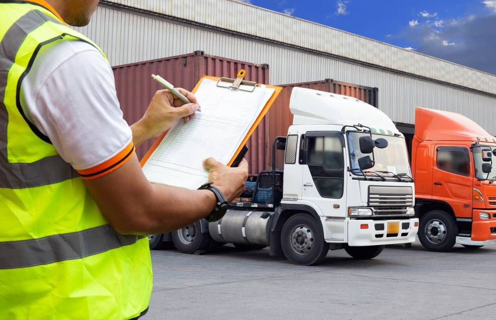 Freight,Transportation.,Warehouse,Worker,Are,Holding,Clipboard,With,Control,Loading